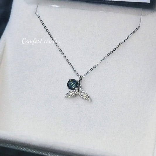 Fishtail Pendant set with Blue Diamonds