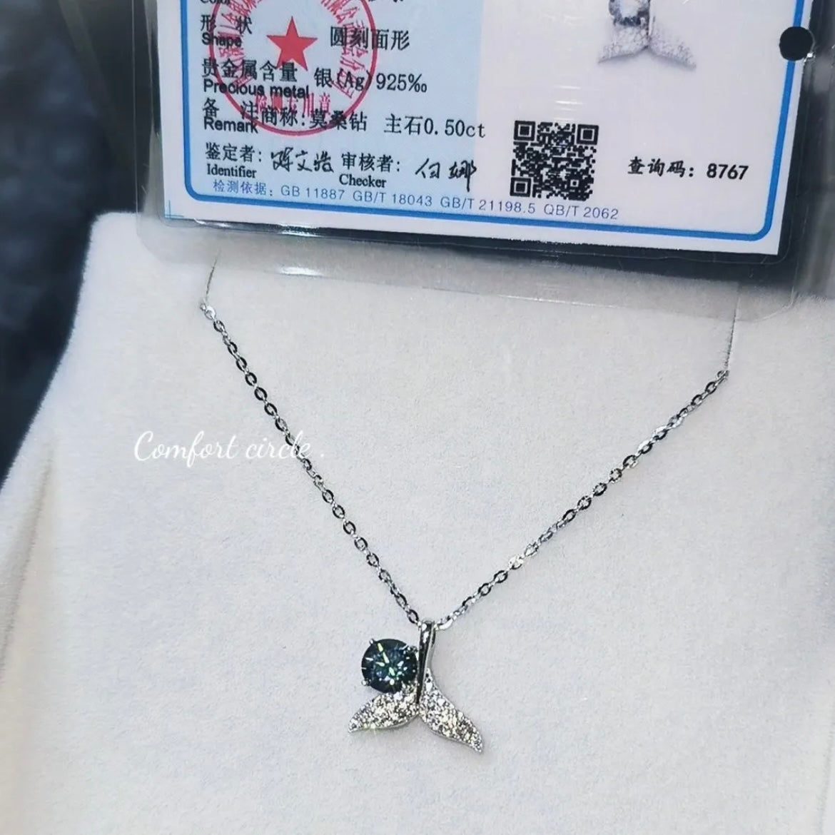 Fishtail Pendant set with Blue Diamonds