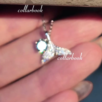 Fishtail Pendant set with Blue Diamonds